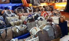 Large collection of famous fake handbags on display at one of the shopping centres in Bandung. The fake handbags are widely sold cheaply here.