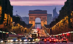 A photo of the Champs-Élysées in Paris at dusk
