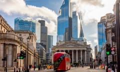 Royal Exchange building and skyscrapers in City of London, UK
