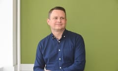 Photo of Mark Shrimpton, chief people officer at Wright Hassall, at his desk