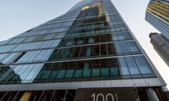CITY OF LONDON, UK - SEPTEMBER 27, 2018:  Reflection of Heron Tower skyscraper in 100 Bishopsgate surrounded by other tall buildings