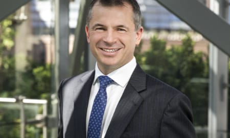 Photograph of Ashurst managing partner Paul Jenkins outside the firm's offices