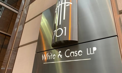WASHINGTON - FEBRUARY 26, 2020: WHITE & CASE LLP sign at entrance to law firm