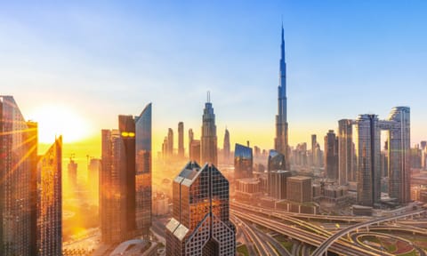 A view of Dubai's skyline at sunset