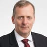 Formal headshot of John Malpas